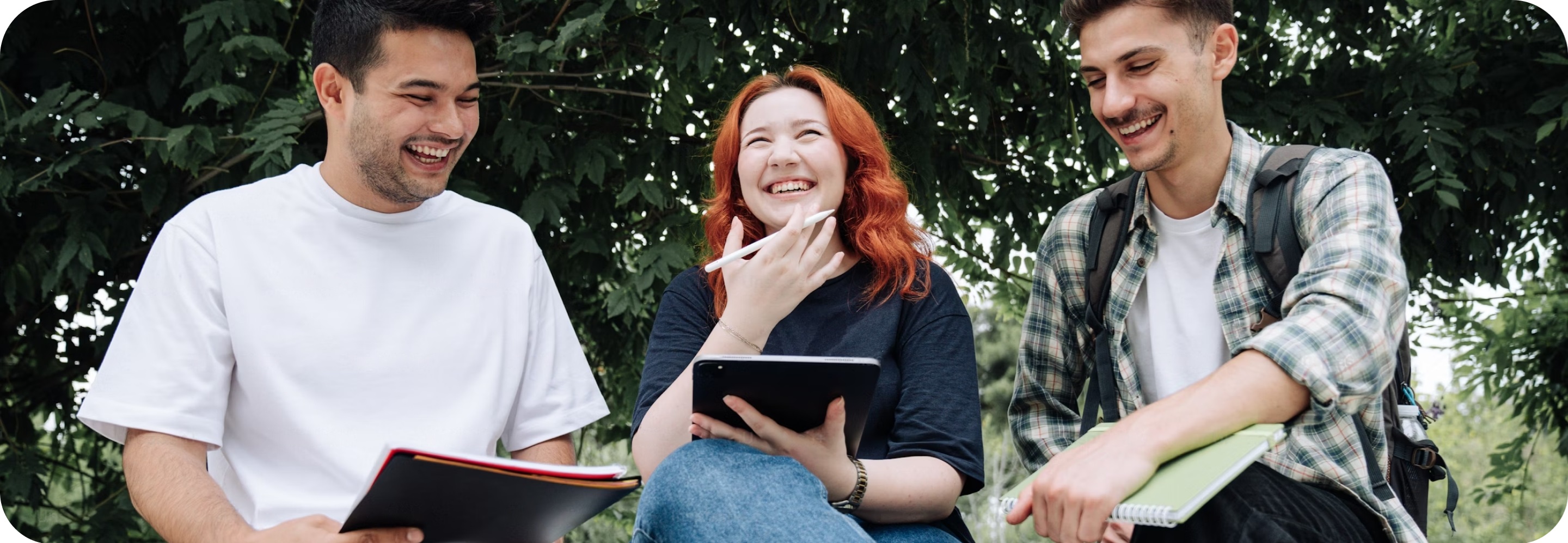 Happy students collaborating on their college plans